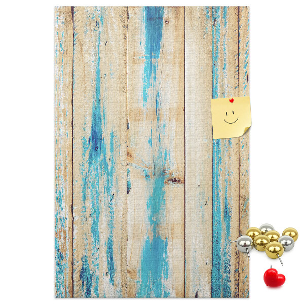 Decoración pizarra de corcho Panel de madera antiguo con detalles azules.