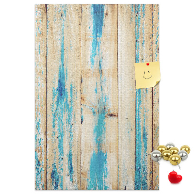 Decoración pizarra de corcho Panel de madera antiguo con detalles azules.