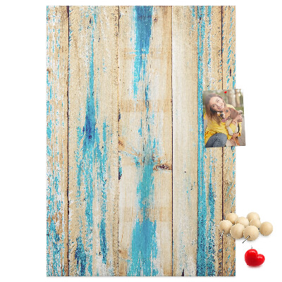 Decoración pizarra de corcho Panel de madera antiguo con detalles azules.