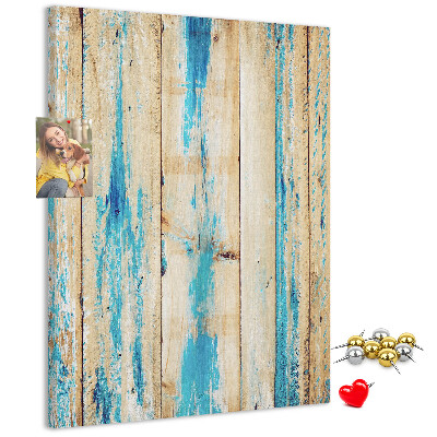 Decoración pizarra de corcho Panel de madera antiguo con detalles azules.