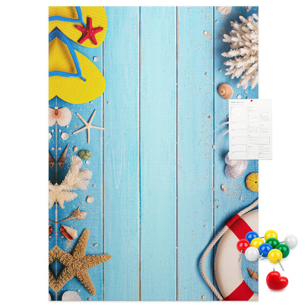 Decoración pizarra de corcho Playa de verano con conchas y arena.