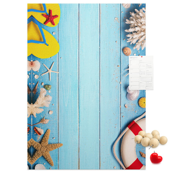 Decoración pizarra de corcho Playa de verano con conchas y arena.