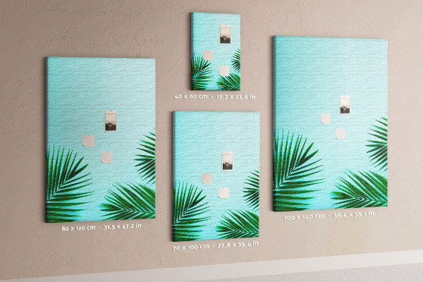 Tablero de corcho para pared Hojas tropicales sobre un fondo azul