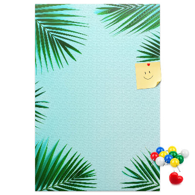 Tablón de corcho Hojas de palmera sobre un fondo azul