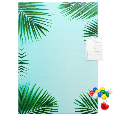 Tablón de corcho Hojas de palmera sobre un fondo azul