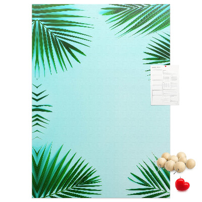 Tablón de corcho Hojas de palmera sobre un fondo azul