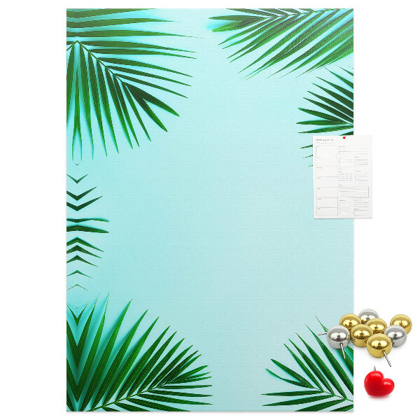 Tablón de corcho Hojas de palmera sobre un fondo azul