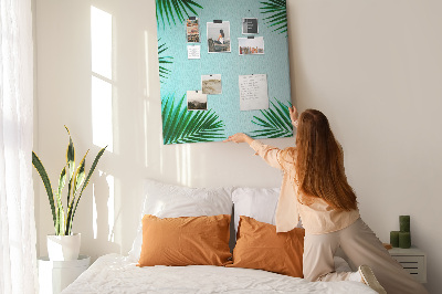 Tablón de corcho Hojas de palmera sobre un fondo azul