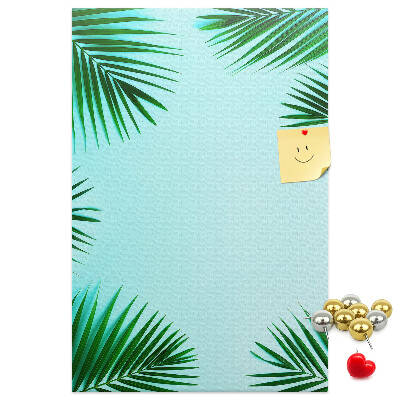 Tablón de corcho Hojas de palmera sobre un fondo azul