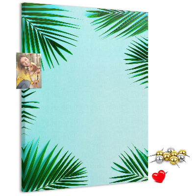 Tablón de corcho Hojas de palmera sobre un fondo azul