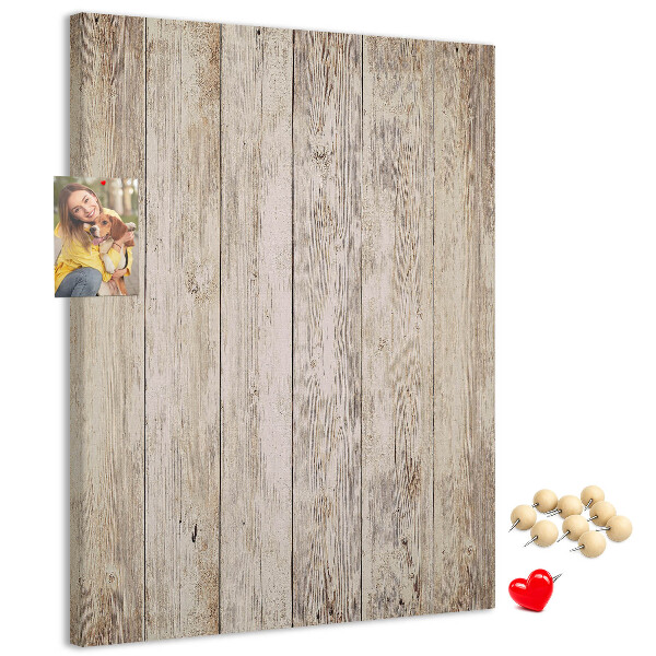Tablero de corcho para pared Tablas rústicas en un tono natural.