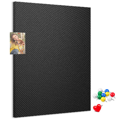 Tablero de corcho para pared Textura negra con un sutil patrón de carbón.