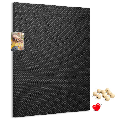 Tablero de corcho para pared Textura negra con un sutil patrón de carbón.