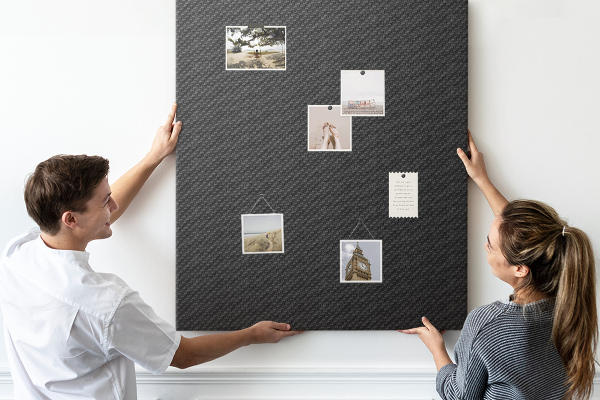 Tablero de corcho para pared Textura negra con un sutil patrón de carbón.