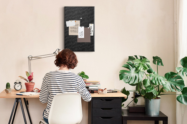 Tablero de corcho para pared Textura negra con un sutil patrón de carbón.