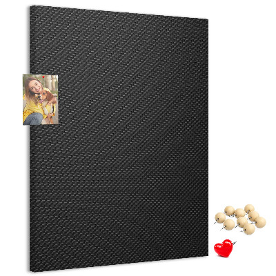 Tablero de corcho para pared Textura negra con un sutil patrón de carbón.