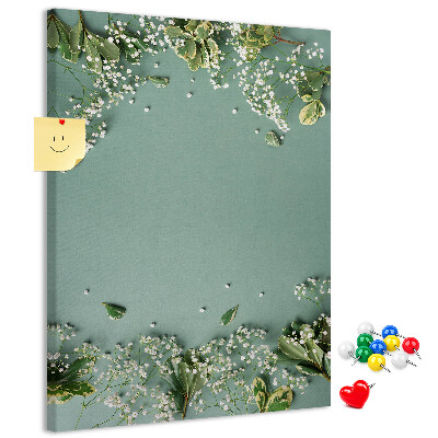 Decoración pizarra de corcho Fondo verde con delicadas flores y hojas.