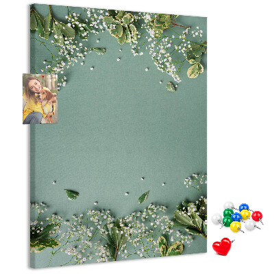 Pizarra de corcho decorativa fondo verde con flores y hojas delicadas
