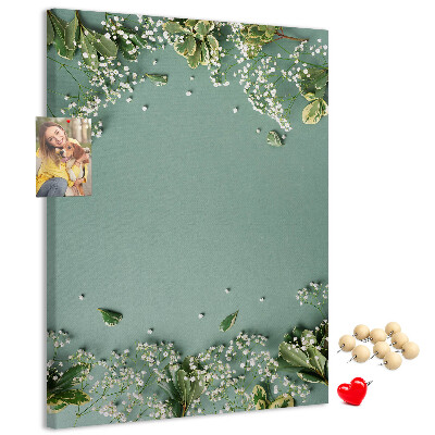 Pizarra de corcho decorativa fondo verde con flores y hojas delicadas