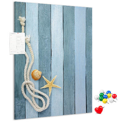 Tablero de corcho para pared con diseño de ambiente costero, tablones azules y una concha