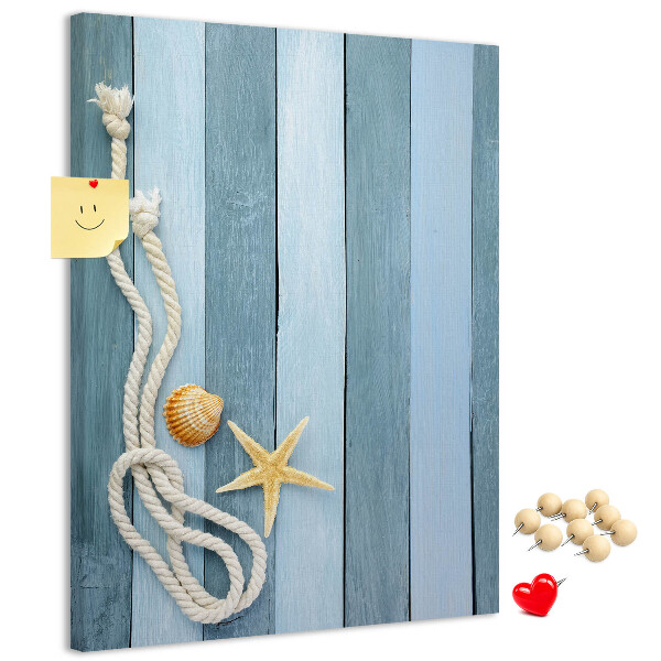 Tablero de corcho para pared con diseño de ambiente costero, tablones azules y una concha