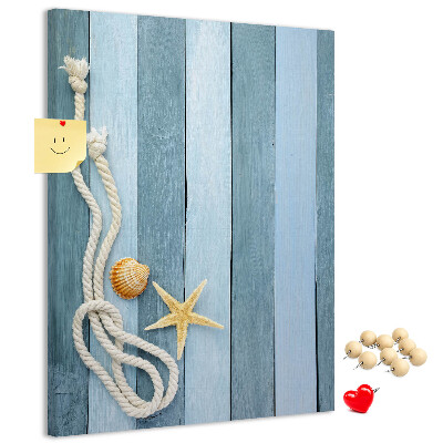 Tablero de corcho para pared con diseño de ambiente costero, tablones azules y una concha