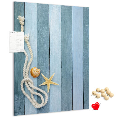 Tablero de corcho para pared con diseño de ambiente costero, tablones azules y una concha