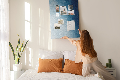 Tablero de corcho para pared en tonos de azul con un delicado tejido