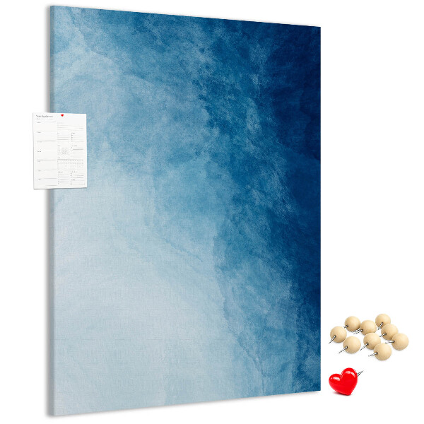 Tablero de corcho para pared en tonos de azul con un delicado tejido