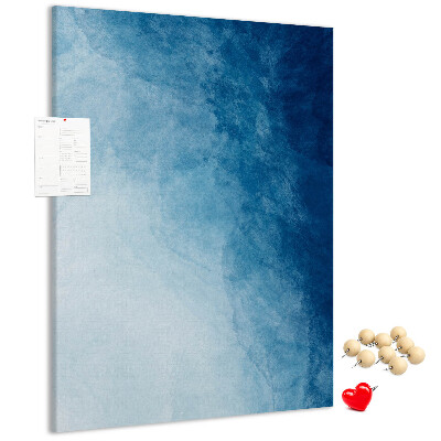 Tablero de corcho para pared en tonos de azul con un delicado tejido