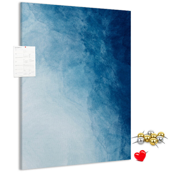 Tablero de corcho para pared en tonos de azul con un delicado tejido