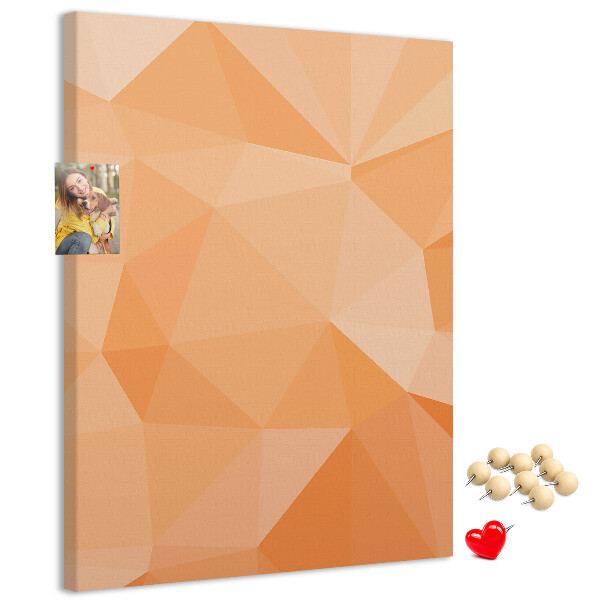 Tablero de corcho para pared con diseño geométrico en tonos naranja y beige