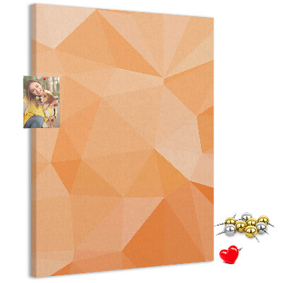 Tablero de corcho para pared con diseño geométrico en tonos naranja y beige