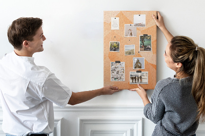 Tablero de corcho para pared con diseño geométrico en tonos naranja y beige