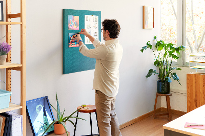 Pizarra de corcho decorativa con diseño de formas geométricas en tonos azules
