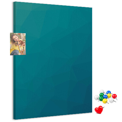 Pizarra de corcho decorativa con diseño de formas geométricas en tonos azules