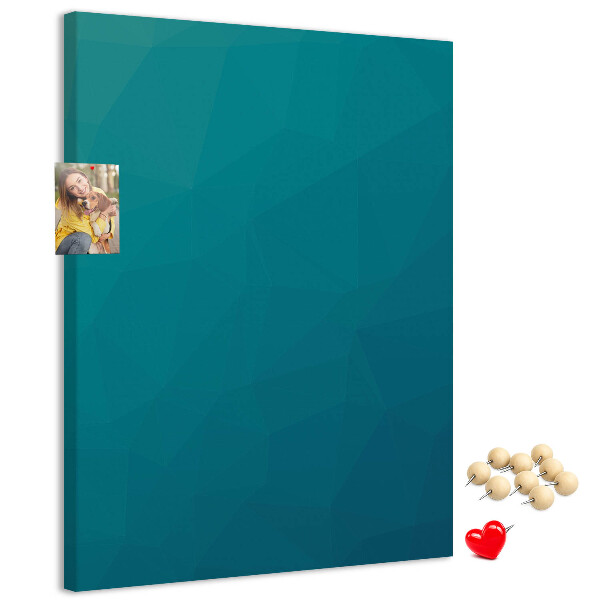 Pizarra de corcho decorativa con diseño de formas geométricas en tonos azules