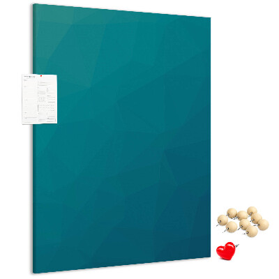 Pizarra de corcho decorativa con diseño de formas geométricas en tonos azules