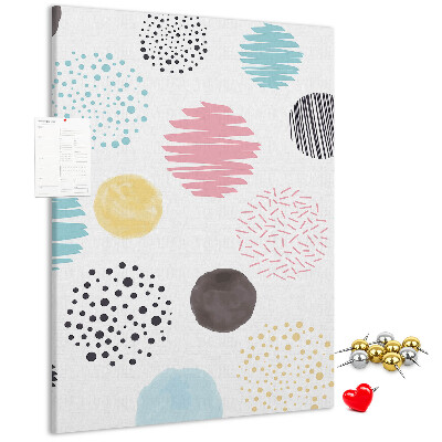 Tablero de corcho con diseño de manchas y líneas coloridas