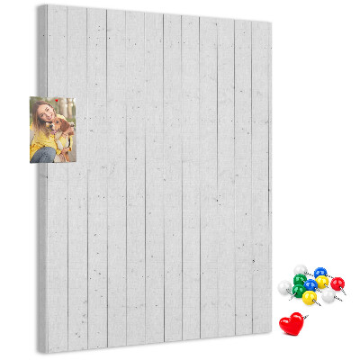 Pizarra de corcho decorativa con fondo de textura de madera clara