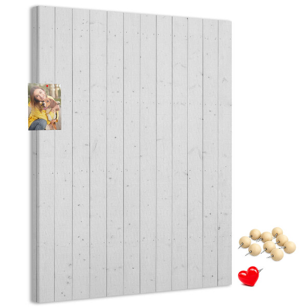 Pizarra de corcho decorativa con fondo de textura de madera clara
