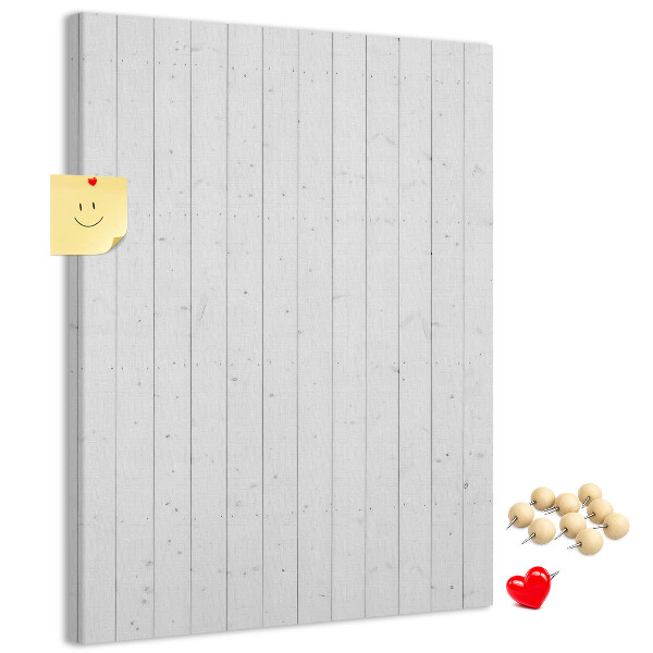 Pizarra de corcho decorativa con fondo de textura de madera clara