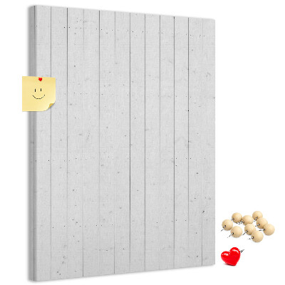 Pizarra de corcho decorativa con fondo de textura de madera clara