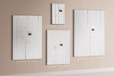 Pizarra de corcho decorativa con fondo de textura de madera clara