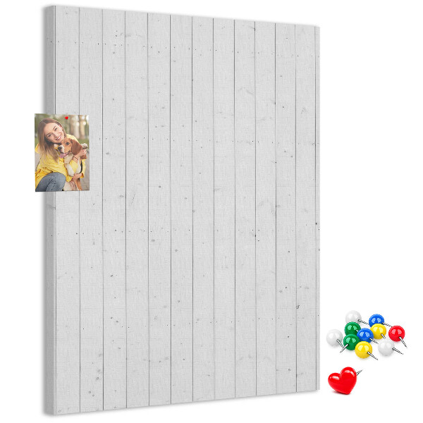 Pizarra de corcho decorativa con fondo de textura de madera clara