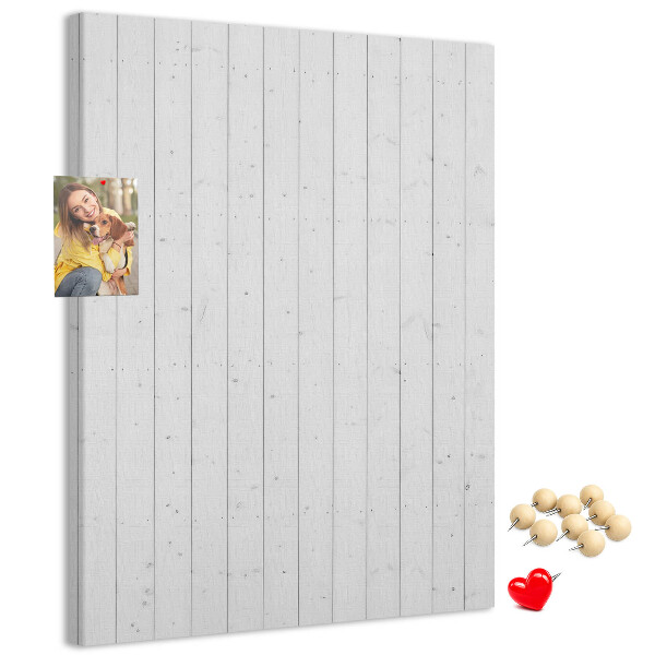 Pizarra de corcho decorativa con fondo de textura de madera clara