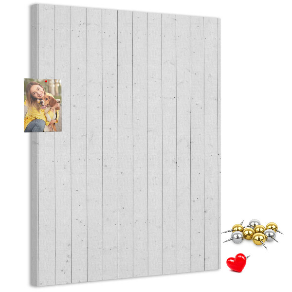 Pizarra de corcho decorativa con fondo de textura de madera clara