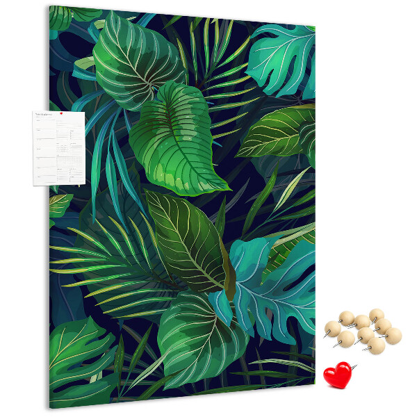 Pizarra de corcho decorativa diseño de hojas tropicales sobre fondo oscuro