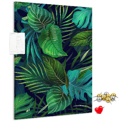 Pizarra de corcho decorativa diseño de hojas tropicales sobre fondo oscuro