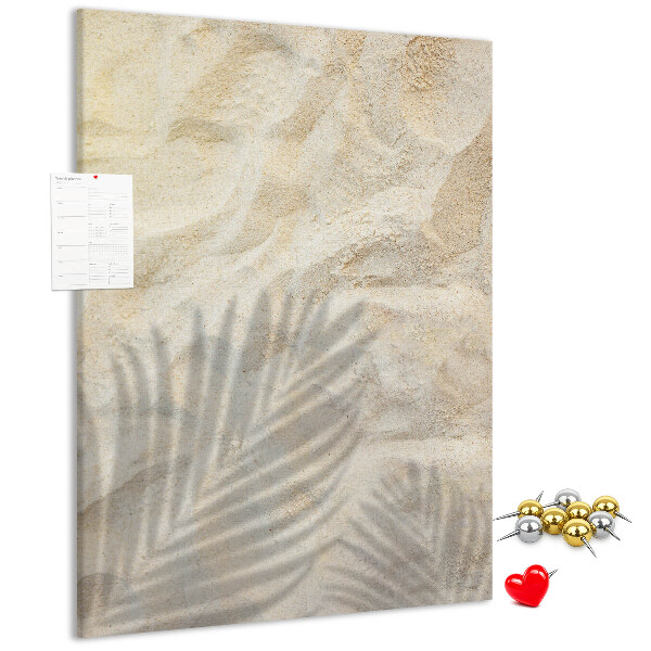 Tablero de corcho para pared con diseño de arena del desierto y la delicada sombra de una hoja